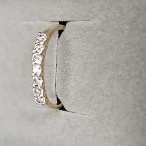 Genuine diamond and 14kt wedding band size 7 sizeable